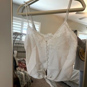 White cami with pin striped tank. Lace detail at top with tie at bottom.
